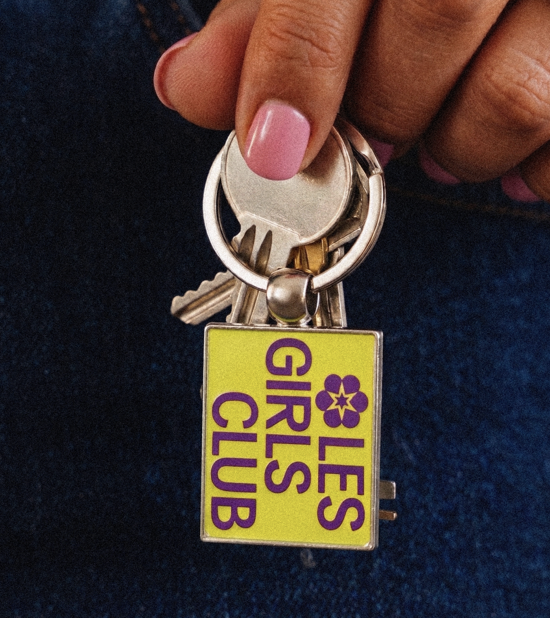 c﻿lose up for a set of keys with a “LES Girls Club” keychain